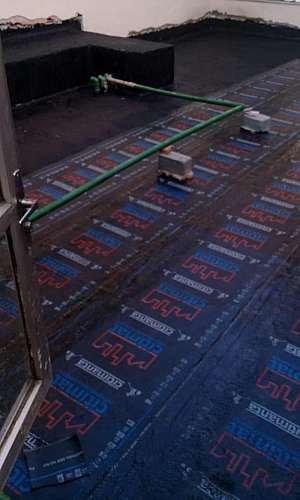 Aplicação de manta asfáltica Aplicação de manta asfáltica